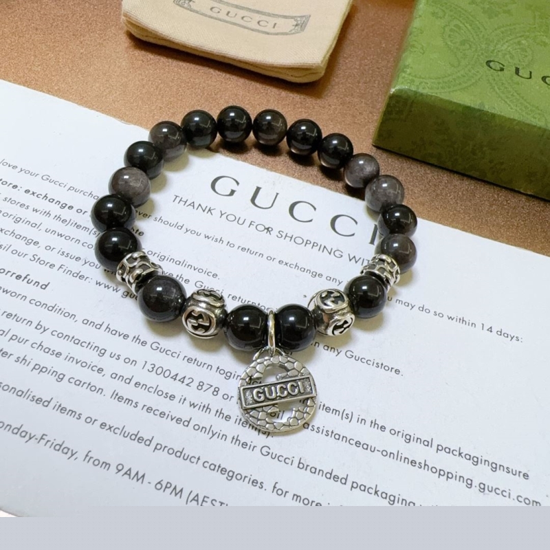 G*u*i bracelets